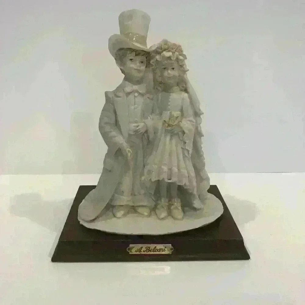 A Belcari Vintage Bride and Groom Figurine